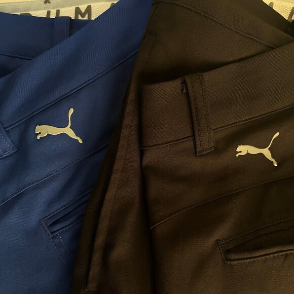 Puma Golf Men's lot of 2 solid black and blue flat front Pants 34 X 30 EUC - Picture 1 of 6